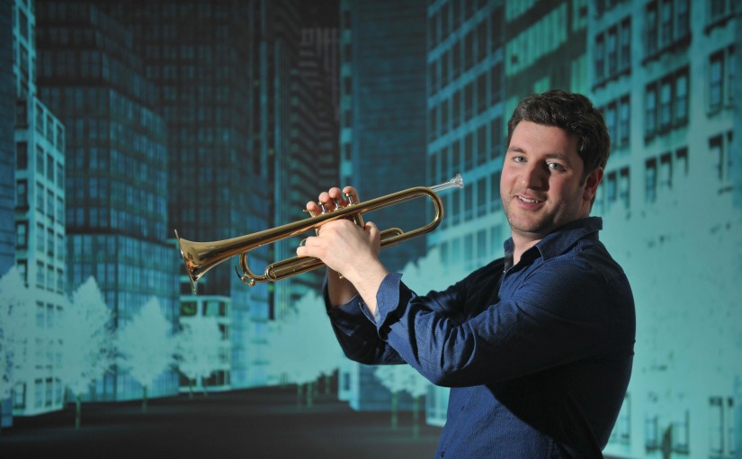 An image of Finlay with a trumpet